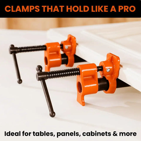 Four Pack Half Inch Pipe Clamps For Woodworking With Beefy Cast Iron Body And High Torque Lead Screw in use on wood panels