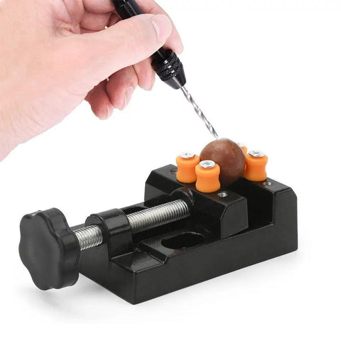 Universal Mini Drill Press Vise Clamp For Jewelry And DIY Projects Table Bench Vise with drill in use on a small object