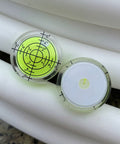 Mini Acrylic Bubble Spirit Level Pack With Hella Precise Degree Markings For Dead On Accurate Framing Picture Hanging And Camera Setup. Two acrylic bubble levels on a surface.