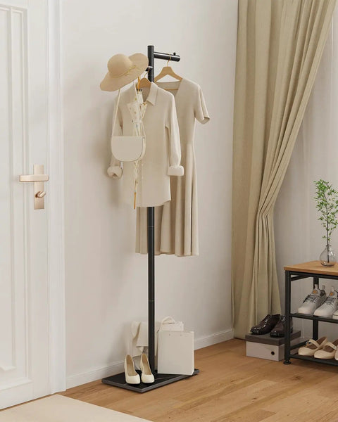 Freestanding Metal Coat Rack With Z Shaped Design, 175cm Tall Black Garment Tree On Heavy Rock Base in modern bedroom