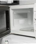 Open microwave with installed 10 Piece Microwave Mica Insulation Sheets For Easy To Cut To Fit No Fuss Heat Resistant Waveguide Cover