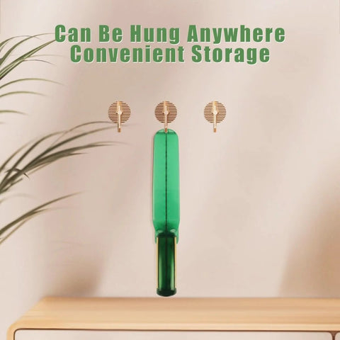 Ergonomic Mattress Lifter Wedge And Bed Maker Tool hung on wall for storage; view of tool design and hanging capability.