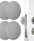 Grey Silicone Door Stopper Wall Protectors, 4 Pack shown with buffer cushions on door, self-adhesive wall bumpers detail