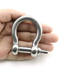 Hardcore 304 Stainless Steel Bow Shackle With Tight Screw Pin and M10 Beefy Rigging Hardware in hand for outdoor gear.