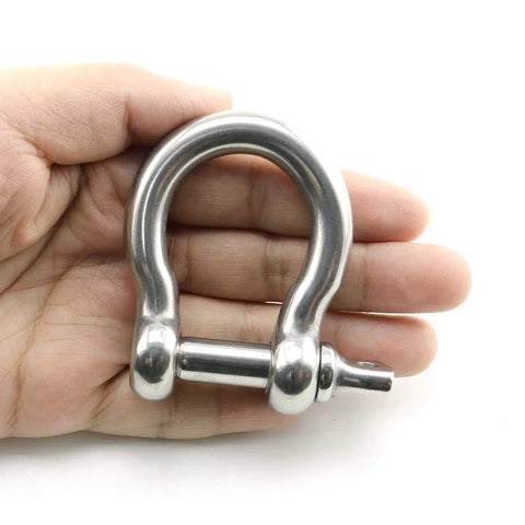 Hardcore 304 Stainless Steel Bow Shackle With Tight Screw Pin and M10 Beefy Rigging Hardware in hand for outdoor gear.