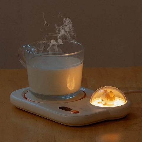 Portable Digital Cup Warmer With Three Heat Settings Hits The Spot Every Time Keeps Your Daily Brew Steaming Hot with a steaming cup of milk.