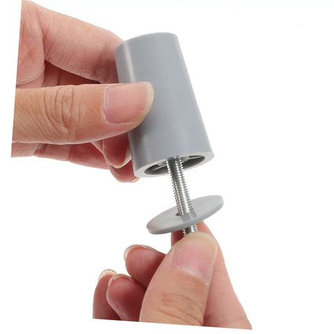 Badass Hurricane Shutter Hardware Plus Window Shutter Stopper Kit featuring a light gray roller blind bumper in hand.