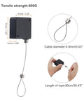 Hella Secure Retractable Cable Lock With Sturdy Double Sided Adhesive Mounting Pad For Phones TV Boxes And Remotes Black 4 Pack showcasing cable length and strength.