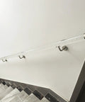Built Like A Tank Clear Acrylic Stair Railing Kit With Heavy Duty Silver Brackets And Scratch Resistant End Caps For Indoor Outdoor Steps No Sweat Setup Safety Handrail And Modern Balusters 18 Foot Run mounted on wall.