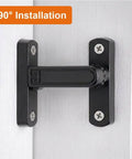 Adjustable Flip Gate Latch Lock For Sliding Barn Doors Heavy Duty Zinc Alloy Build Smooth 90 To 180 Degree Swing Easy Top Bottom Left Right Mounting No Sweat Install Glossy Gold Finish Closet Hardware - Black latch with screws on white door.