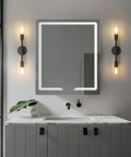 Two Light Vanity Sconce in Matte Black installed in modern bathroom setting