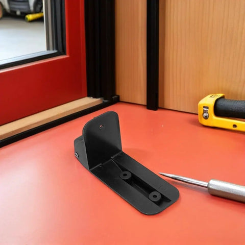 Rock Solid Heavy Duty Non Swivel Casters With L Shape Plate Mount for Speaker Boxes and Tool Chests, black bracket on red surface.
