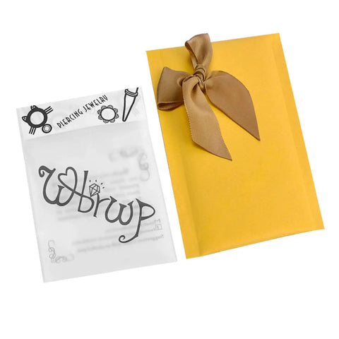Dope Hollow Silicone Ear Tunnels And Plugs Set packaging with yellow envelope and brown ribbon