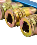 Close-up of Aluminum Rectangular Manifold Kit with Four Quarter Inch Steel Industrial Couplers and One Quarter Inch Steel Plug