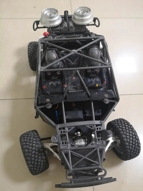 Hardened Steel Ring Gear And Planetary Gear Set For Traxxas UDR Unlimited Desert Racer frame and tires view.