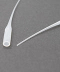 Close-up of CA Glue Nozzle Extender Tips Set 200 Pieces For Precision Bottle Applicators on gray background.