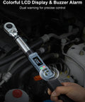 Digital Torque Wrench Three Eighths Inch Drive With Quick Socket Head Change and LED Display in use on car engine