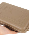 Close-up of Rugged Survival Storage Box With Shockproof Organizer for Outdoor Tools in tan color held by hand