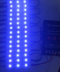 200 Pack 12V RGB 5050 LED Module Lights with Three LED Emitters, waterproof with peel and stick backing, displayed with LED controller