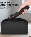 21 Inch Grab And Go Portable Selfie Stick Tripod With Quick Release Magnetic Lock fits in small black bag on table.