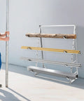 Heavy Duty Four Tier Horizontal Lumber Storage Rack For Garage Built Like A Tank Holds Wood Boards Firmly Up To 440 Pounds Rust Resistant Silver Garage Boss with assorted materials loaded.