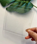 Straight Up Reliable Acrylic Sashiko Stencil For Quilting And Embroidery Crafts 2Mm Thick reusable template held in hand.