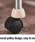 Close-up of universal swivel wheels on the Slick Rolling Utility Cart With Four Roomy Shelves Built From Heavy Duty Plastic And Stainless Steel.