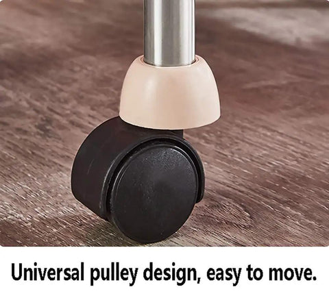 Close-up of universal swivel wheels on the Slick Rolling Utility Cart With Four Roomy Shelves Built From Heavy Duty Plastic And Stainless Steel.