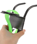 Hand holding Pro Grade Tree Climbing Gear With Steel Gaffs And Non Slip Ankle Buckles For Arborists And Outdoor Adventurers Steady Ascent Spikes For Trimming Fruit Picking Hunting Rock Climbing And Tree Work Portable 45 Steel Gaffs