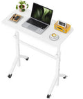 Sit Stand Mobile Desk With Wheels Adjustable Height From 28.3 To 46.5 Inches Rolling Standing Desk With Lockable Wheels Portable White Desk For Walking Pad And Treadmill with laptop and items displayed
