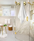 Gold Stainless Steel Suction Hooks For Bathroom And Kitchen, Heavy Duty 15 Lb Capacity, Removable No Drill Wall Hangers in a shower