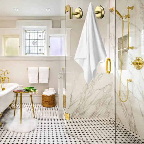Gold Stainless Steel Suction Hooks For Bathroom And Kitchen, Heavy Duty 15 Lb Capacity, Removable No Drill Wall Hangers in a shower