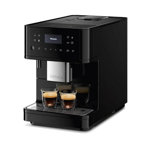 Sleek Fully Automatic Coffee And Espresso Machine With Silent Steel Grinding Chamber For Killer Cup Creations And Rich Silky Milk Foam For Serious Home Baristas, showing two espresso shots.