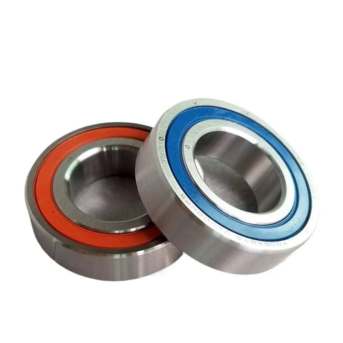 Top Tier Pair Of Sealed Angular Contact Speed Spindle Bearings Engineered With Slick Ball Track Surfaces And Twin Seal Covers For Silent Spin High Rpm Lathe Operations In The Standard 30X62X16 Spec, showcasing two sealed bearings with colored seals.
