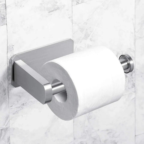 Self Adhesive Toilet Paper Holder No Drill Wall Mount Stainless Steel Brushed Finish Stick On Bathroom Roll Holder For Kitchen Washroom Rustproof Easy Clean Quick Install No Tools Required displayed on marble wall with toilet paper.