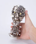 Dope 3D Metal Puzzle For Adults Mechanical Steampunk Skeleton Model Kit With 200+ Pieces, Durable Stainless Steel And Copper Parts, Desk Display Ornament, Compact Skeleton Sculpture For Office, Studio Or Gaming Room Decor, hand-held front view