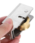 Heavy Duty Sliding Door Roller Replacement Kit With Double Bearings For Whisper Quiet Wardrobe And Patio Glides, metal roller in hand.