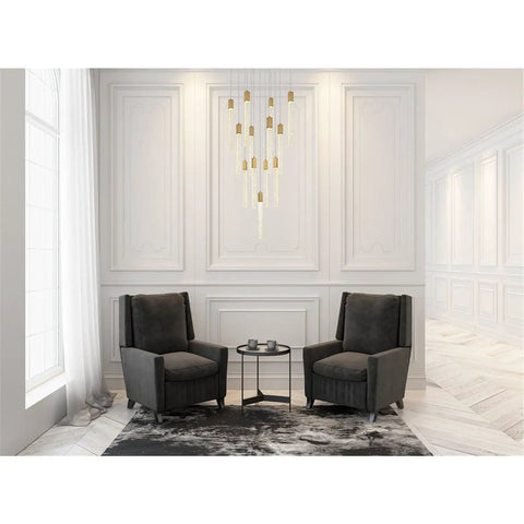 Modern 13 Bulb Pendant Ceiling Light Featuring Satin Gold Hardware And Clear Crystals above two grey armchairs in elegant room.