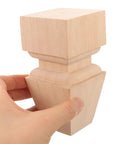 4-Piece Stable Wood Furniture Feet Set For Dresser, Cabinet, And Sofa Legs Replacement, showcased in hand, close-up view.