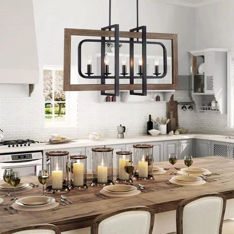 Farmhouse Chandelier Light Fixture With Five Lights In Antique Bronze Oaky Painted Finish above wooden dining table.