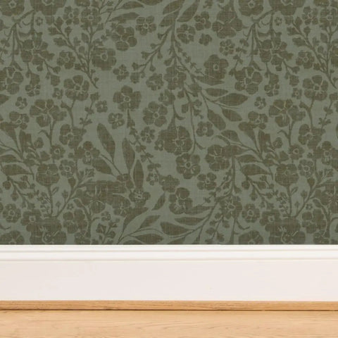 Real Dope Cottage Botanical Wallpaper With Matte Linen Texture And Pvc Free Mix Built For Sturdy Residential Or Commercial Walls That Add A Chill Fresh Vibe To Your Place close-up view of floral pattern on textured green wallpaper.