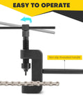 Chain breaker tool from 13 Piece Chain Breaker Tool Kit With Universal Chain Cutter And Riveter Set in use, black handle