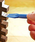 Using 7 Inch Long Silicone Glue Brush For Woodworking Reusable Pro Grade Glue Applicator on wooden joint