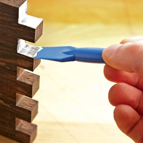 Using 7 Inch Long Silicone Glue Brush For Woodworking Reusable Pro Grade Glue Applicator on wooden joint