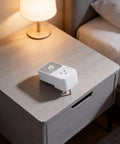 PIR Infrared Motion Sensor Outlet 110V 1800W Auto On Off Switch For Garage Hallway Living Room White ABS Receptacle No Brainer For Security Light Control And Energy Saving Home Automation. White ABS 100×50×70 mm sensor outlet on bedside table