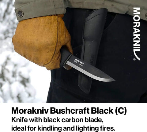 Man holding Carbon Steel Fixed Blade Bushcraft Knife With Sheath, 4.3 Inch Blade, Black Tactical Outdoor Knife For Survival