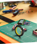 Light Shielding Tape Blackout Tape For Monitors And Windows on desk with tools and electronics