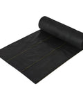 Pro 5 Weed Barrier Fabric 5 Oz Heavy Duty Ground Cover Mat 3 x 250 Feet unrolled showing material texture