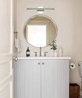Upgrade Your Bathroom With A Sleek 15.7 Inch Vanity Light Fixture, 5W LED Cool White 6000K, Stainless Steel above a round mirror