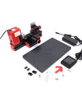 Top Shelf Mini Metal Lathe Machine With Beefy 24w Motor And 20000rpm Precision Woodworking Tool Kit on a flat surface with accessories.